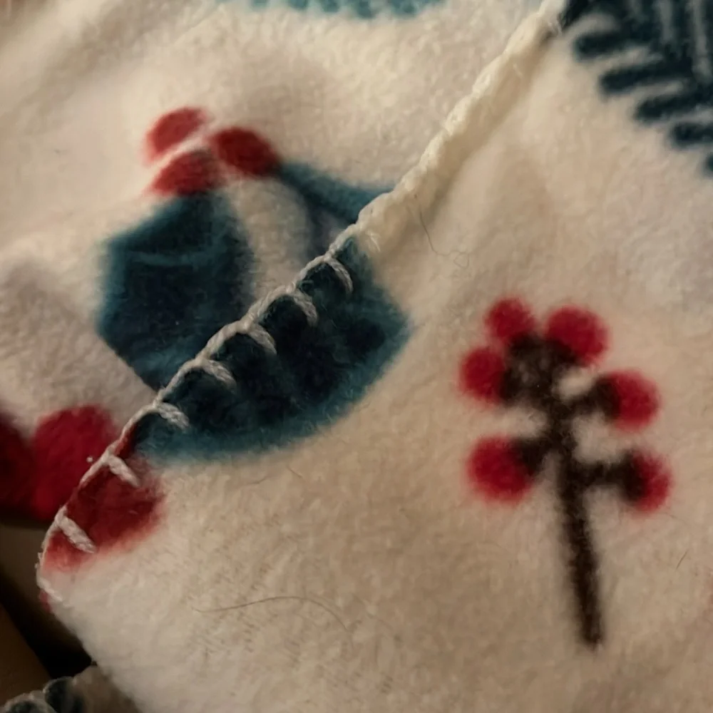 NWT Holiday fleece throw blanket featuring poinsettias, from Colormate